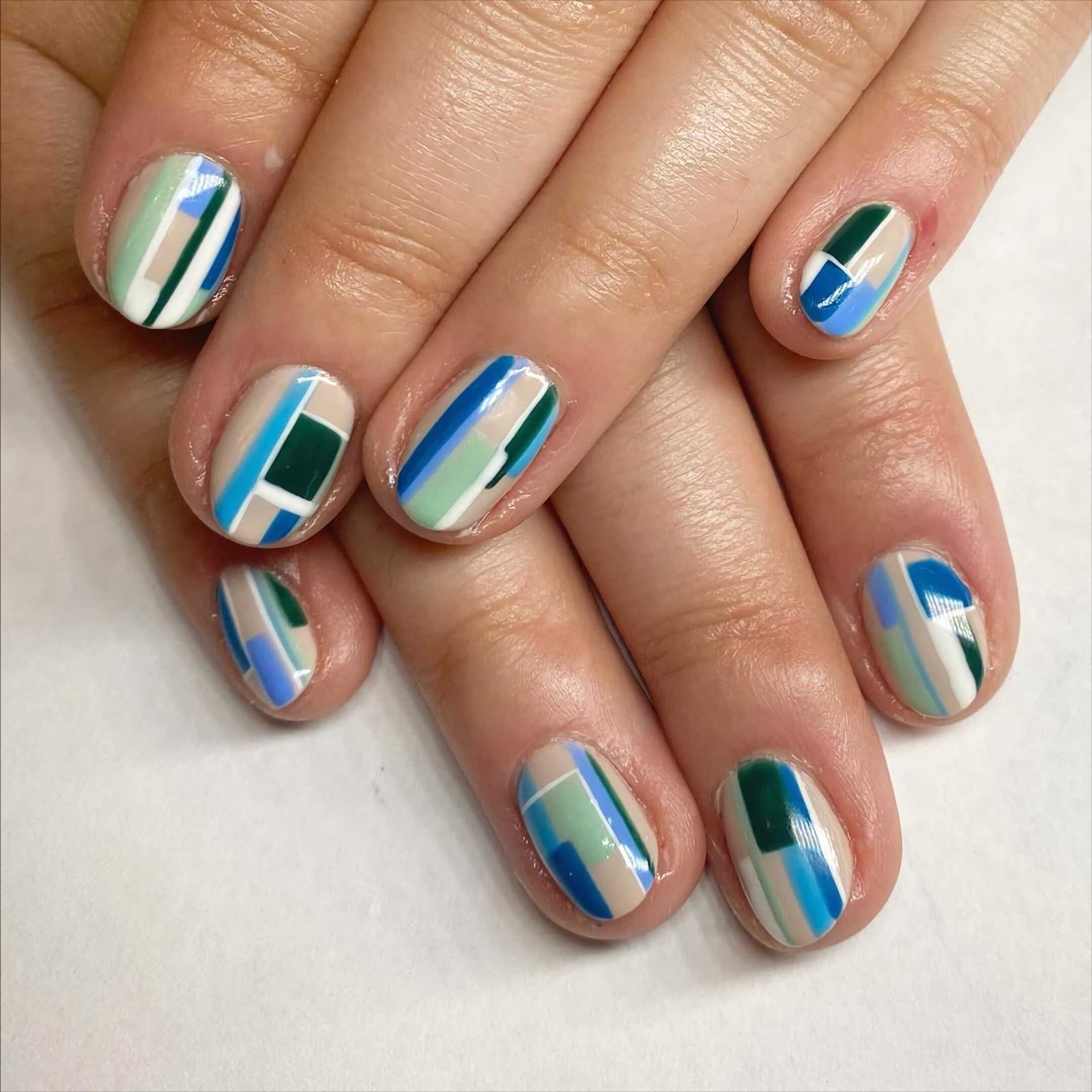 short nails with colorful stripes