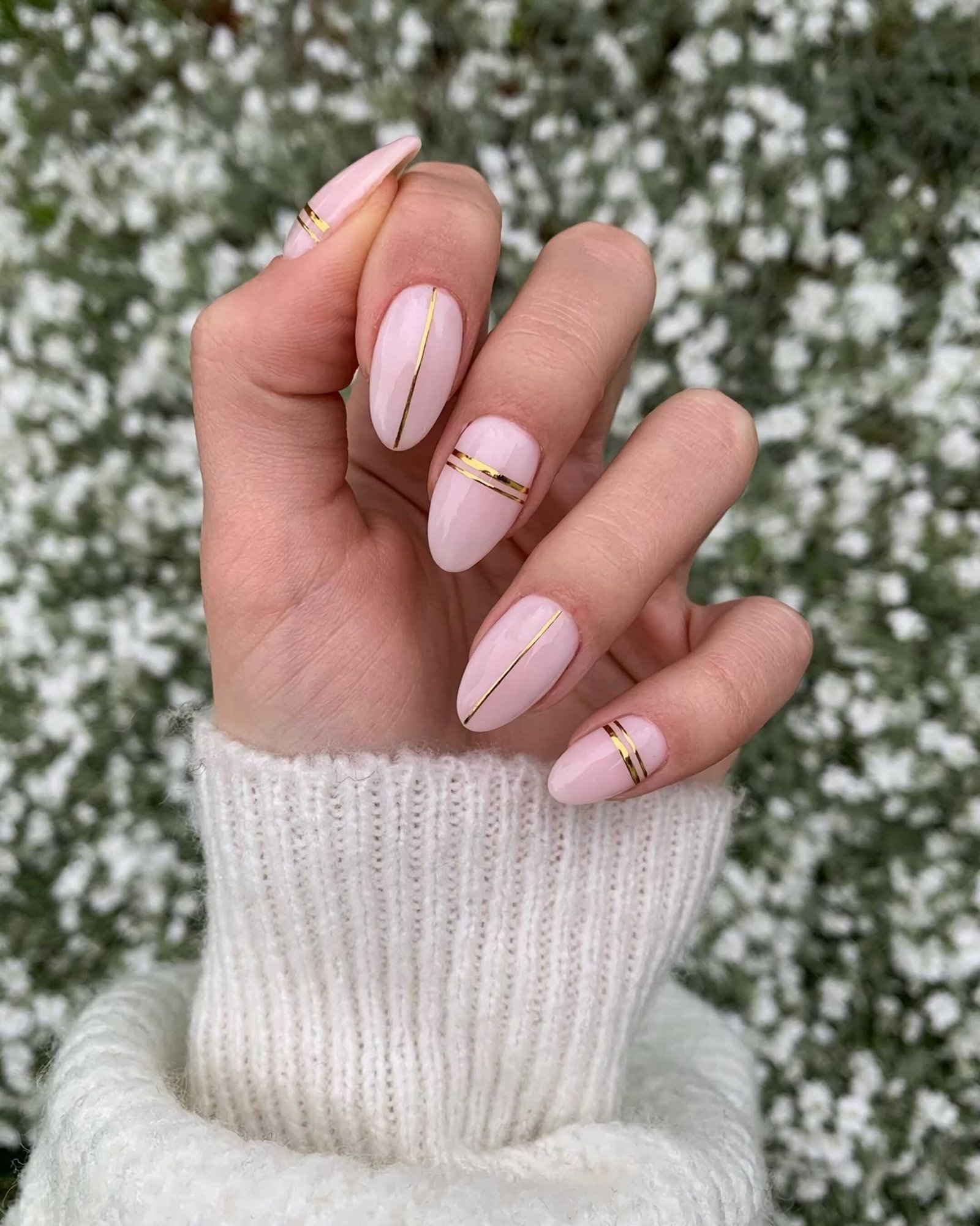 golden manicure with lines for short nails
