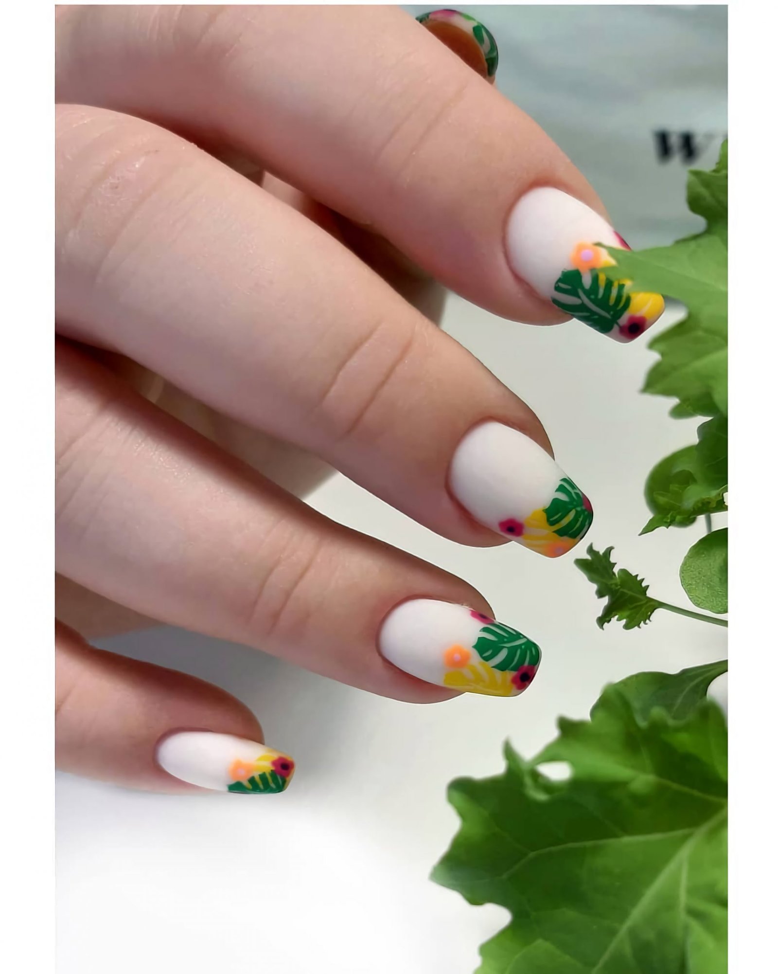 beautiful nails with tropical leaves