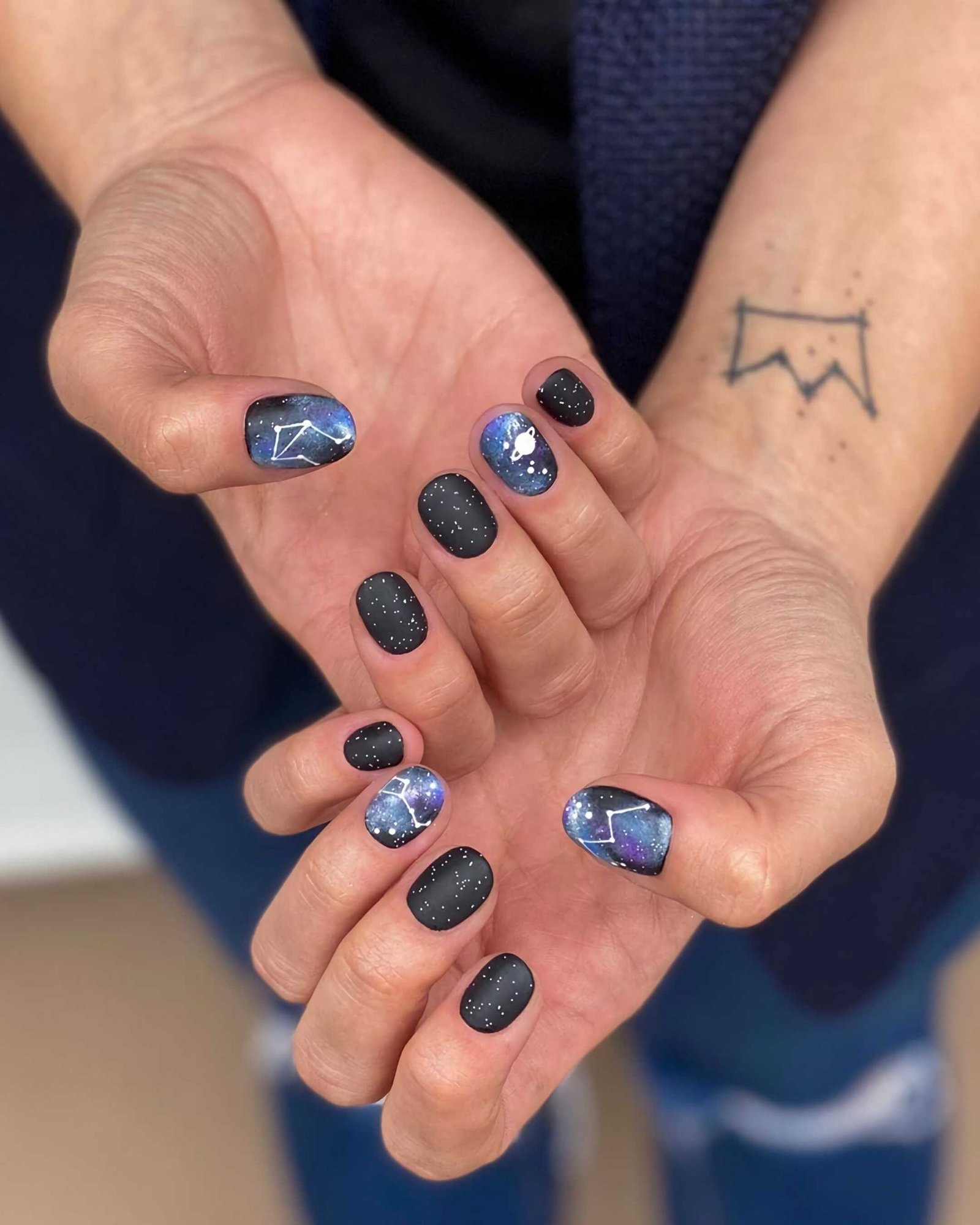 manicure in the form of the universe