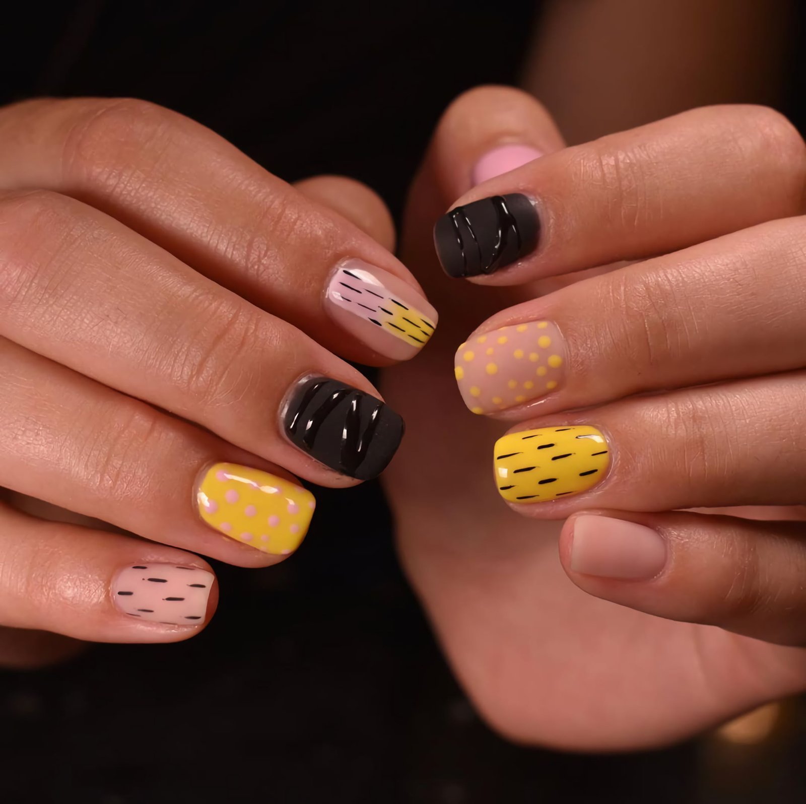 yellow manicure with patterns