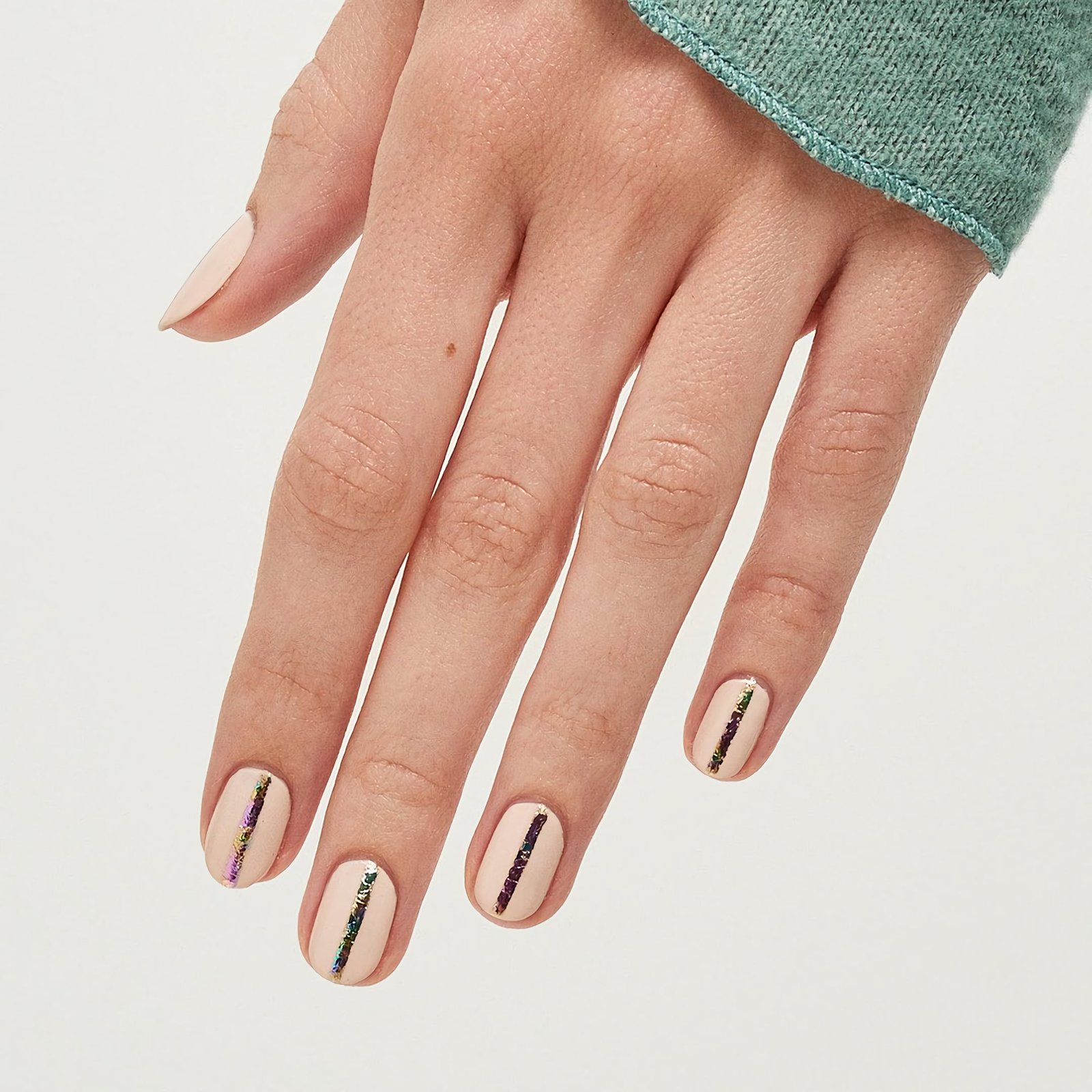 Nude manicure with stripes