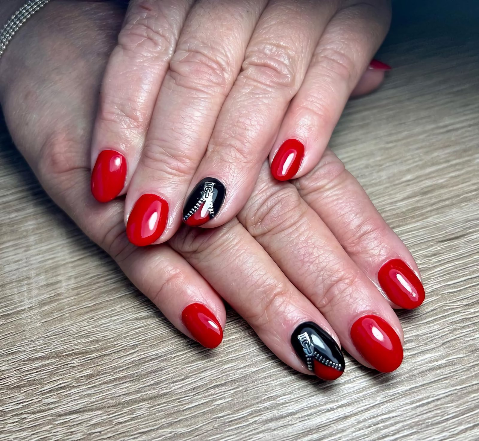 beautiful red manicure with a unique design